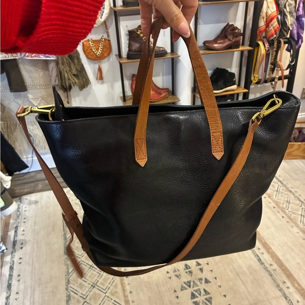Madewell black leather tote with brown handles and removable crossbody strap